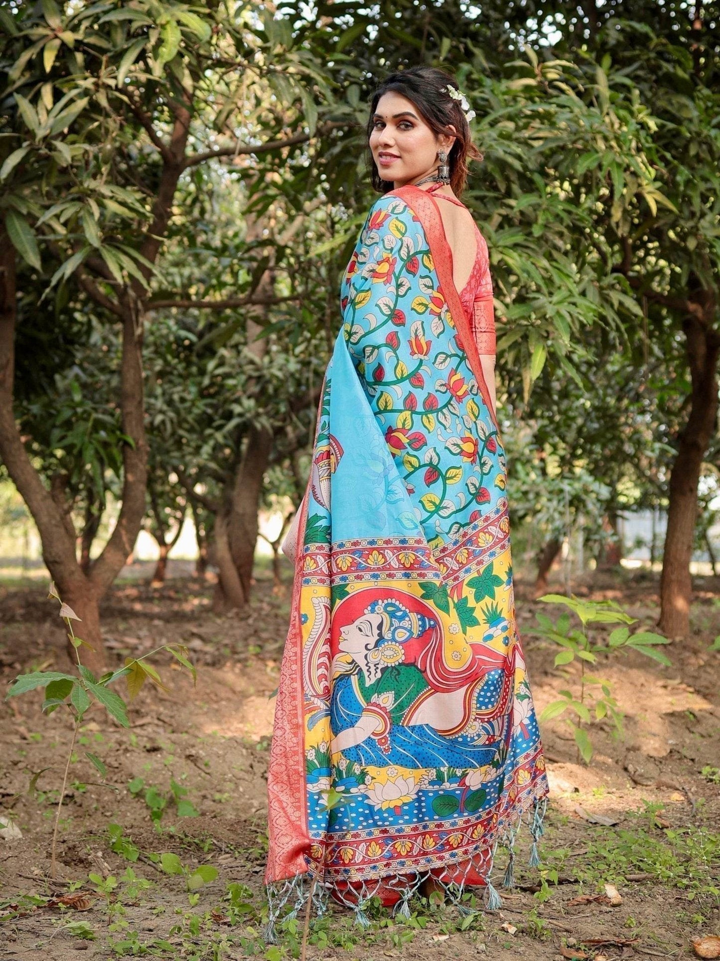 Aqua Blue Tussar Silk Saree with Vibrant Nature-Inspired Prints and Red Zari Border - SEEANS