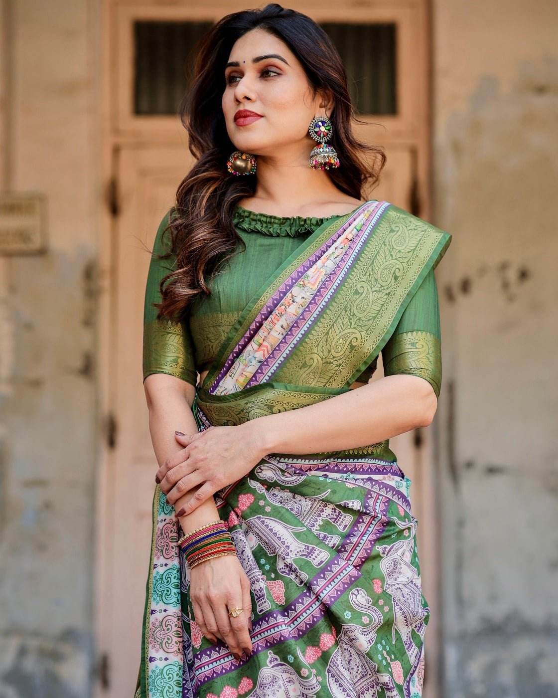 Ivory and Green Tussar Silk Saree with Elephant Motifs and Intricate Zari Border - SEEANS